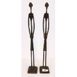 A pair of African style tribal bronze figures, H. 43cm.