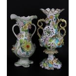 A 19th Century continental porcelain vase relief decorated with flowers. Together with a further