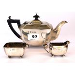 A small hallmarked silver 3 piece bachelor's tea set: tea pot c.1899 Birmingham, sugar and milk