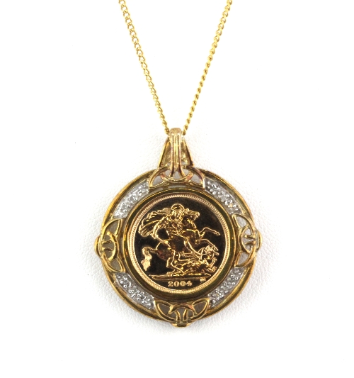 A 9ct yellow gold and diamond mounted half Sovereign 2004, with 9ct yellow gold chain.