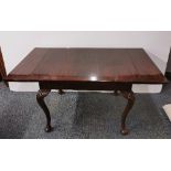 A 1920's mahogany draw leaf table with Queen Anne and shell legs, W. 90cm, L. 105cm opening to
