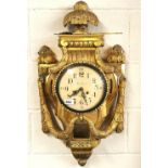 A 19thC Swedish gilt wood cartel clock by Ad. Nyman, H. 76cm.Understood to be in working order.