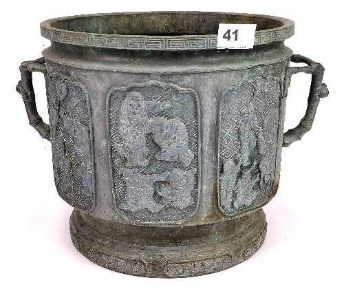 A 19th century Chinese cast bronze planter with bamboo design handles, featuring scenes of