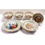 Four bone china cabinet cups, saucers and plates.