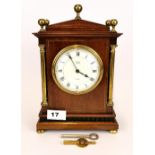 An Asprey, London 1920's/30's mahogany and brass mantle clock. H. 26cm. Understood to be in