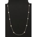 An 18ct white gold (stamped 750) necklace set with ten diamonds approx. 2.80ct. L. 46cm.