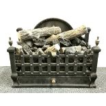 A cast iron and faux log gas fire grate, W. 55cm.