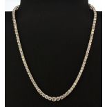 A superb 18ct white gold graduated diamond necklace, approx. 18.75ct, L. 40cm. Valuation for