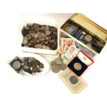 Two boxes of mixed coins and bank notes.