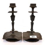 A pair of 19th century bronze aesthetic movement candlesticks. H. 22cm.