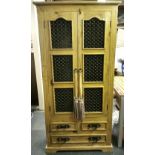An interesting pine and iron grill cabinet, 91 x 181cm.