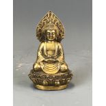 A small Chinese gilt bronze figure of a seated Buddha, H. 14cm.