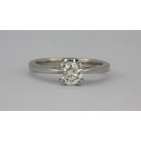 A "Leo diamond" platinum (stamped 950) solitaire ring set with a 0.68ct diamond with certificate (