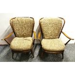 A pair of vintage Ercol armchairs.