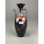 A Chinese brown and black glazed stoneware ewer, possibly Song Dynasty, H. 31cm. Condition: old