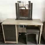 An attractive contemporary wardrobe, W. 81cm, together with a dressing table with mirror, W. 120cm.
