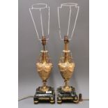 A pair of French gilt bronze table lamps on marble bases. Overall H. 64cm
