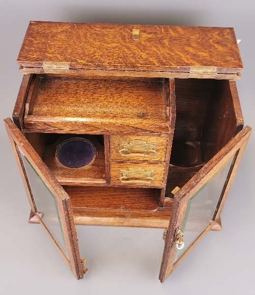 An early 20th Century oak smokers cabinet, H. 30cm. - Image 3 of 3