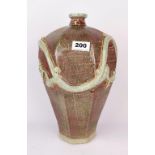 An unusual Chinese relief decorated glazed stoneware vase, H. 35cm.