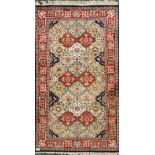 A heavy quality hand woven wool rug, 90 x 157cm.