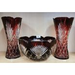 A pair of Bohemian ruby cut glass vases and matching bowl. Vase H. 30cm. Condition: small impact