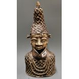 A Benin bronze bust of a tribal chief, H. 37cm.