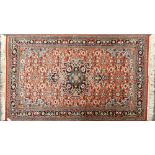 An attractive hand woven wool rug, 94 x 167cm.