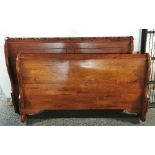 A contemporary hardwood sleigh bed, W. 162cm.