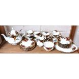 A Royal Albert Old Country Roses tea set, comprising eight cups, saucers, tea plates, milk jug and