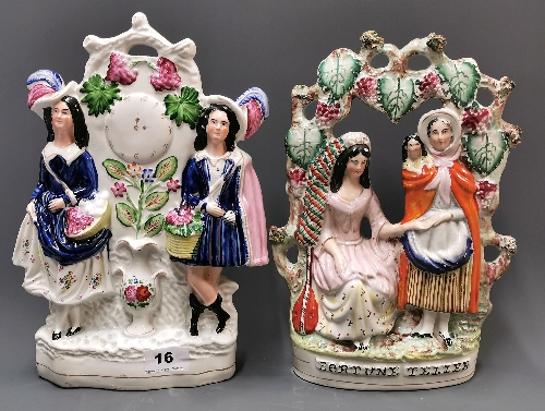 Two Victorian Staffordshire porcelain figures. Tallest 31cm.