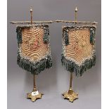 A pair of Regency gilt brass and tapestry table top pole screens, H. 50cm.