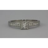 A pretty platinum (stamped 960) solitaire ring set with a princess cut diamond approx 0.5ct with