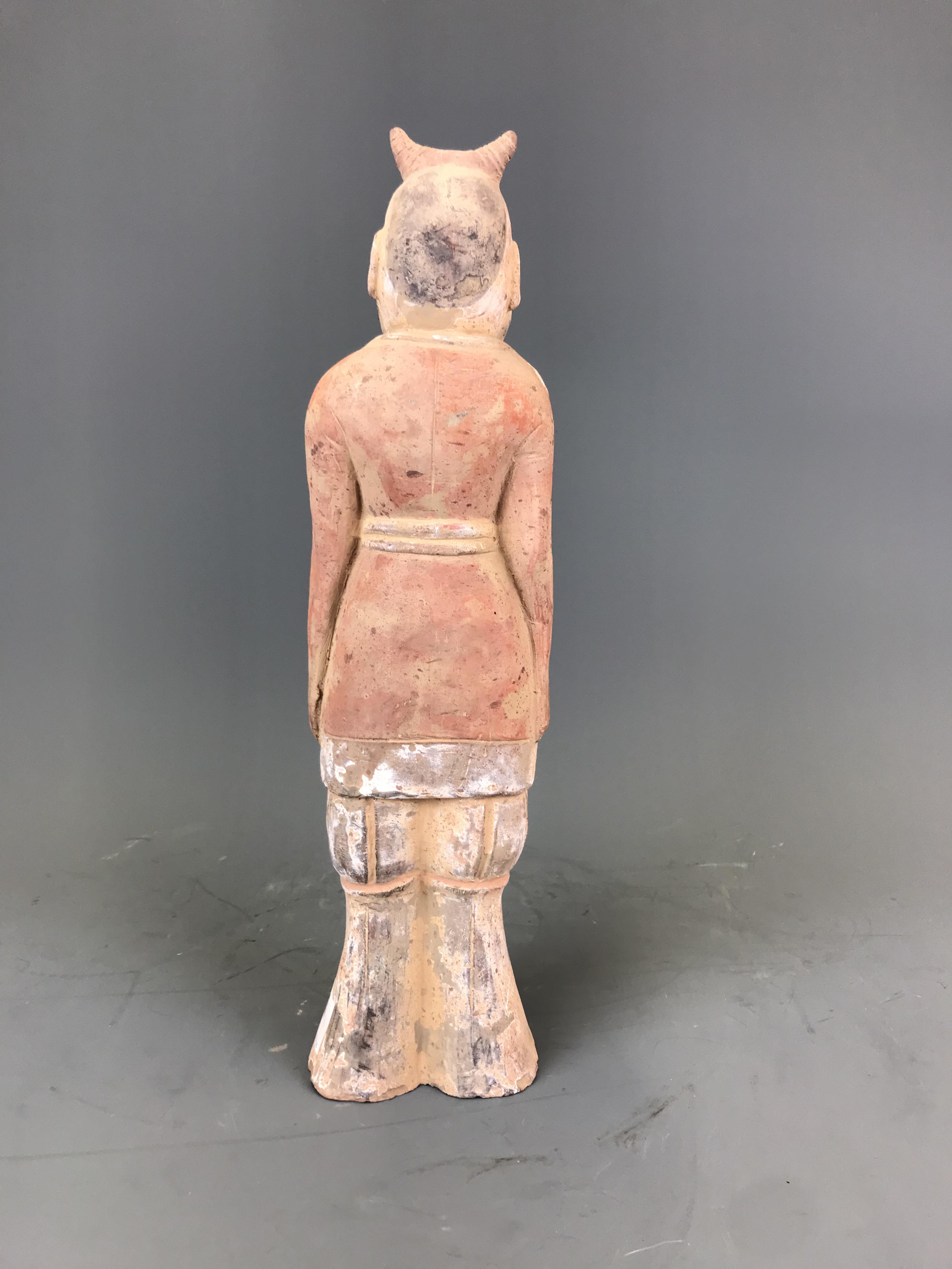 A Chinese Han Dynasty (202 BC -220 AD) style painted pottery figure of a bearded official ( - Image 2 of 2