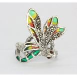 A 925 silver and marcasite enamelled dragonfly shaped ring set with ruby eyes, (N).