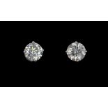 A pair of 18ct white gold stud earrings, approx 1.72ct total