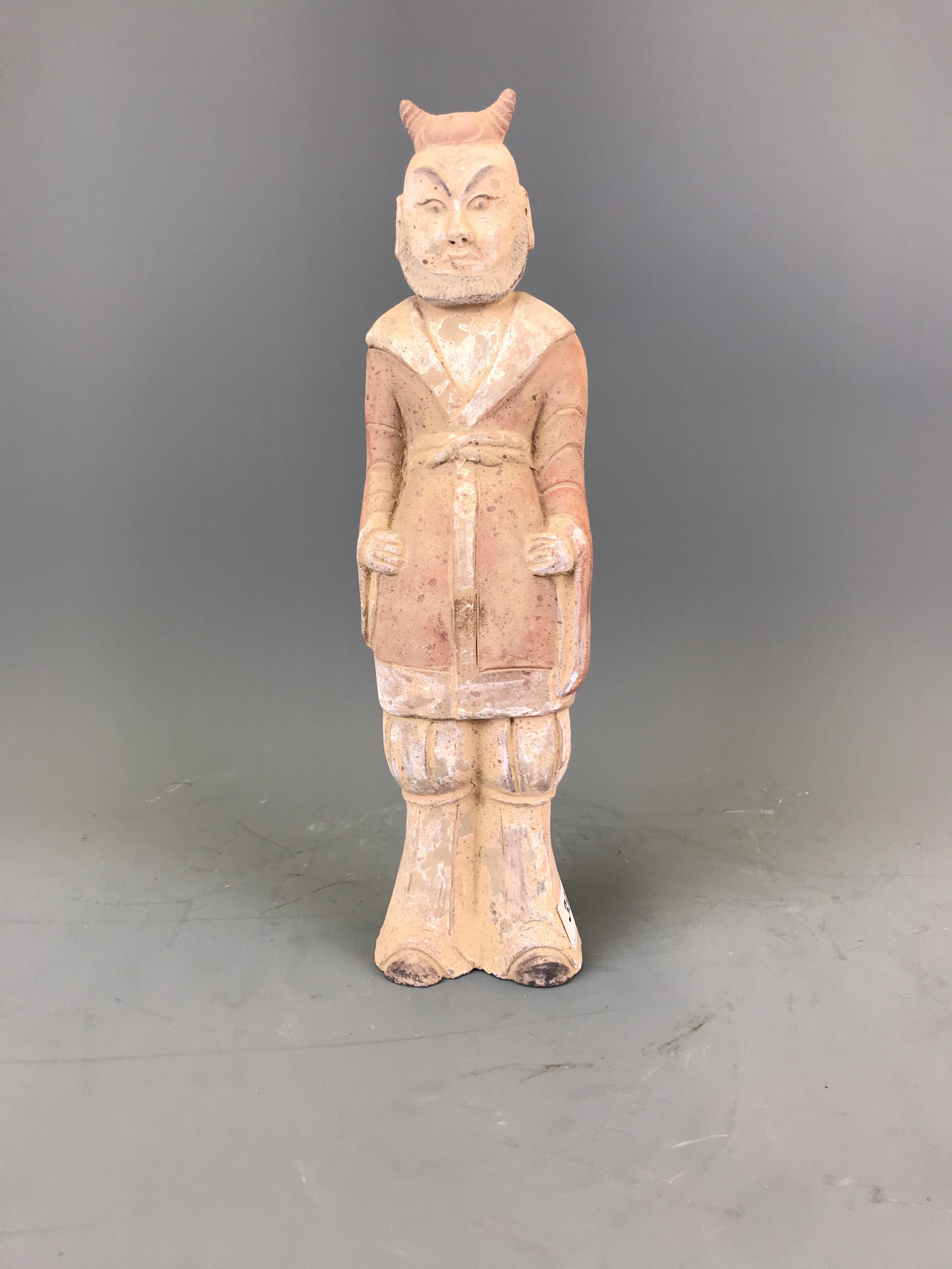 A Chinese Han Dynasty (202 BC -220 AD) style painted pottery figure of a bearded official (