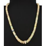 A very pretty single row necklace of facetted opals on a magnetic clasp. L.44cms