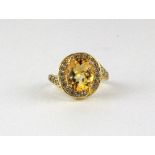 A 925 silver gilt citrine set ring.