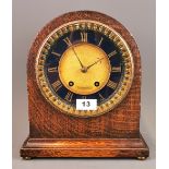 An oak cased Wales and McCulloh, London striking mantle clock, H. 29cm. Condition: understood to