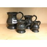 A set of four Victorian Sanders and Sons London pewter measures, largest 10cm.