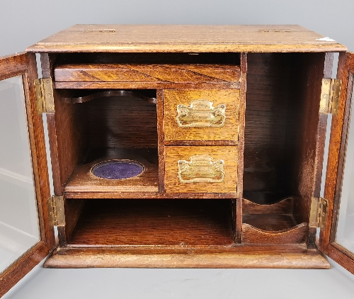 An early 20th Century oak smokers cabinet, H. 30cm. - Image 2 of 3