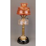 A large Edwardian brass and glass oil lamp and glass shade. Overall H. 58cm.