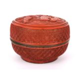 A 19th / early 20th century Chinese cinnabar lacquer box, Dia. 11cm, D. 7.5cm.