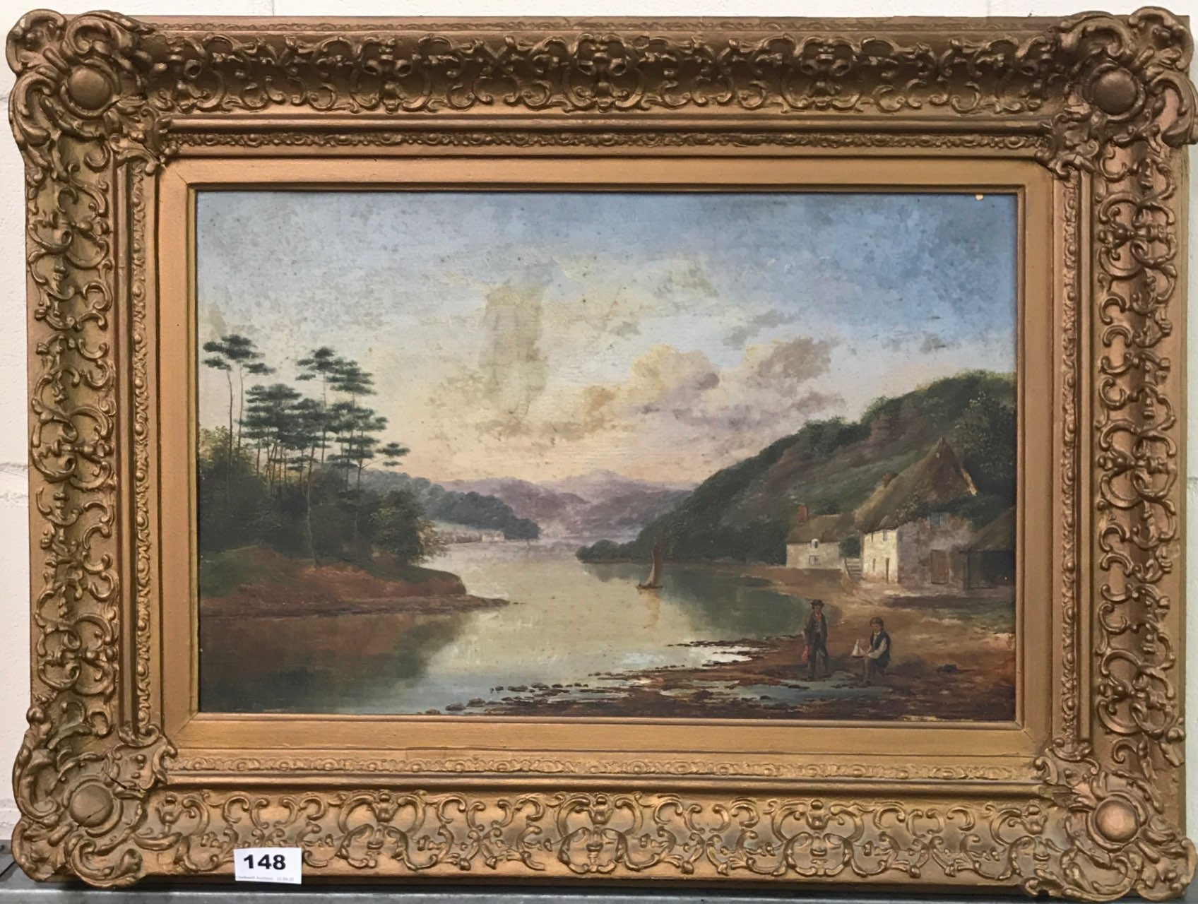 An early 19th century gilt framed oil on board river scene, 70 x 52cm.