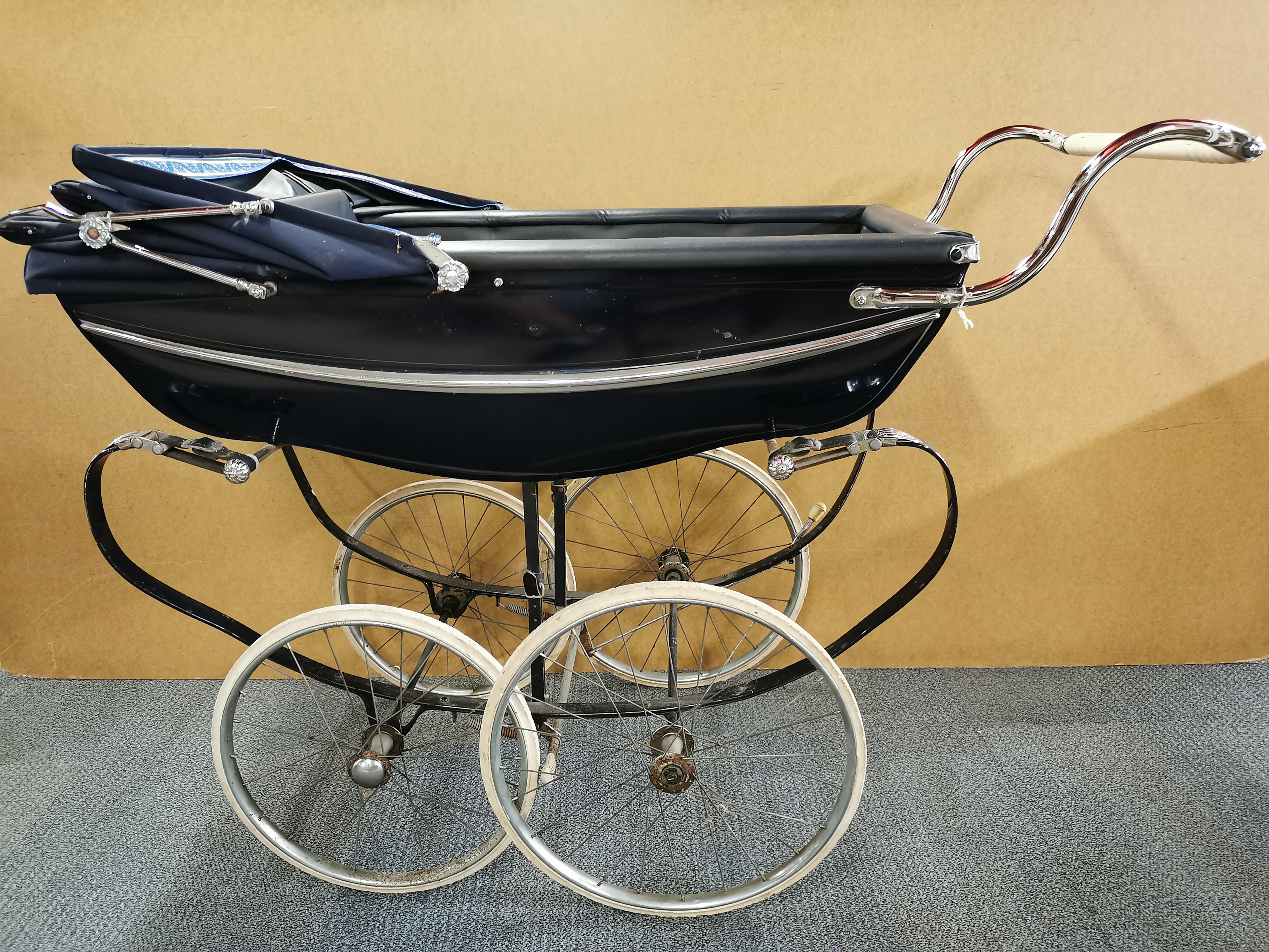 A full size vintage Silver Cross baby's pram.