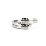 An 18ct white gold diamond set ring, (L.5).