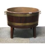 A Georgian mahogany wine cooler, W. 60cm, H. 43cm.