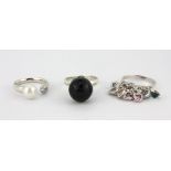 Three 925 silver stone set rings.