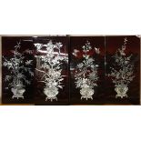 A set of four Oriental mother of pearl and lacquer panels, H. 60cm, W. 30cm.
