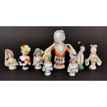 A group of eight porcelain half dolls, tallest 11.5cm.